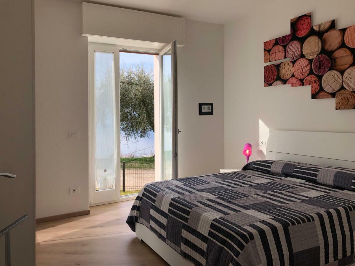 Cosy Torri Apartments ตอร์รีเดลเบนาโก ภายนอก รูปภาพ